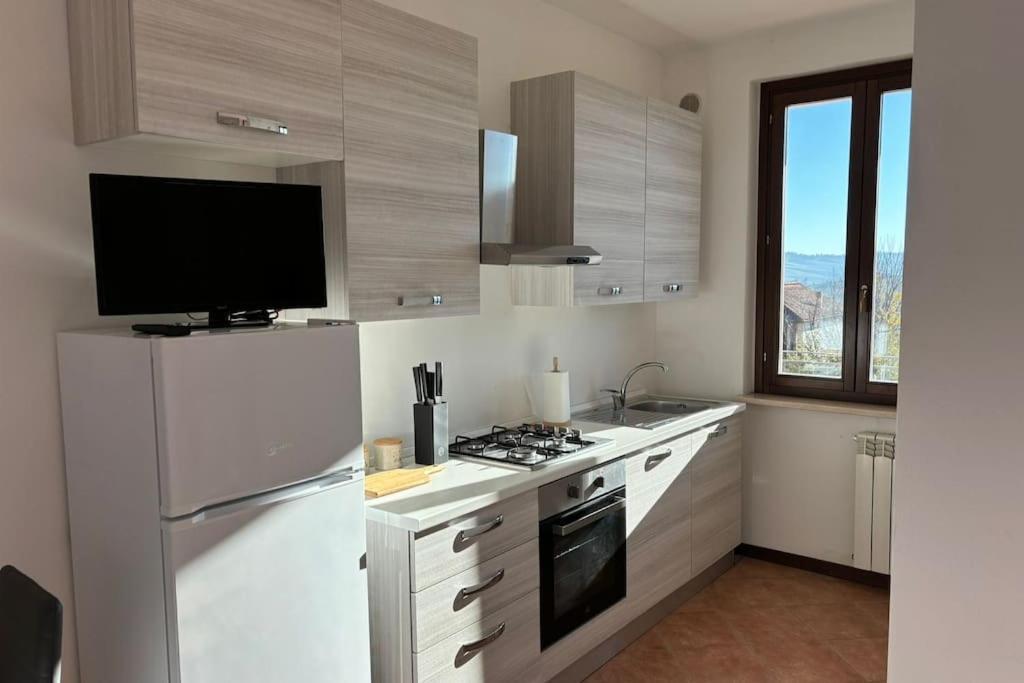 Casa Al Poggio Apartment Castana  ภายนอก รูปภาพ